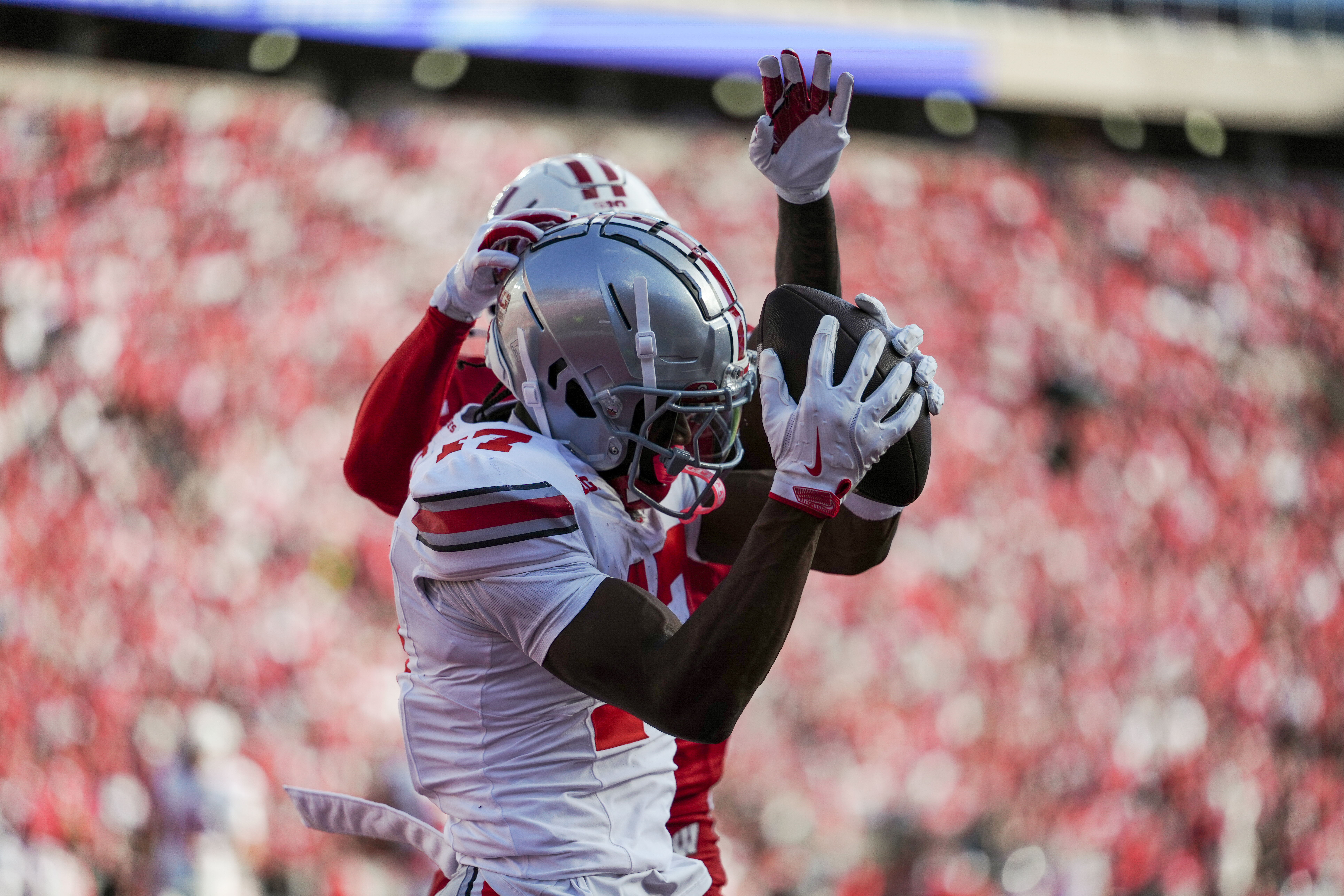 Oct 18, 2025; Madison, Wisconsin, USA; Ohio State Buckeyes wide receiver Carnell Tate (17) catches a touchdown pass in the first half against the Wisconsin Badgers at Camp Randall Stadium on October 18, 2025 in Madison, Wisconsin. Photography by Ross Harried for Second Crop Sports.